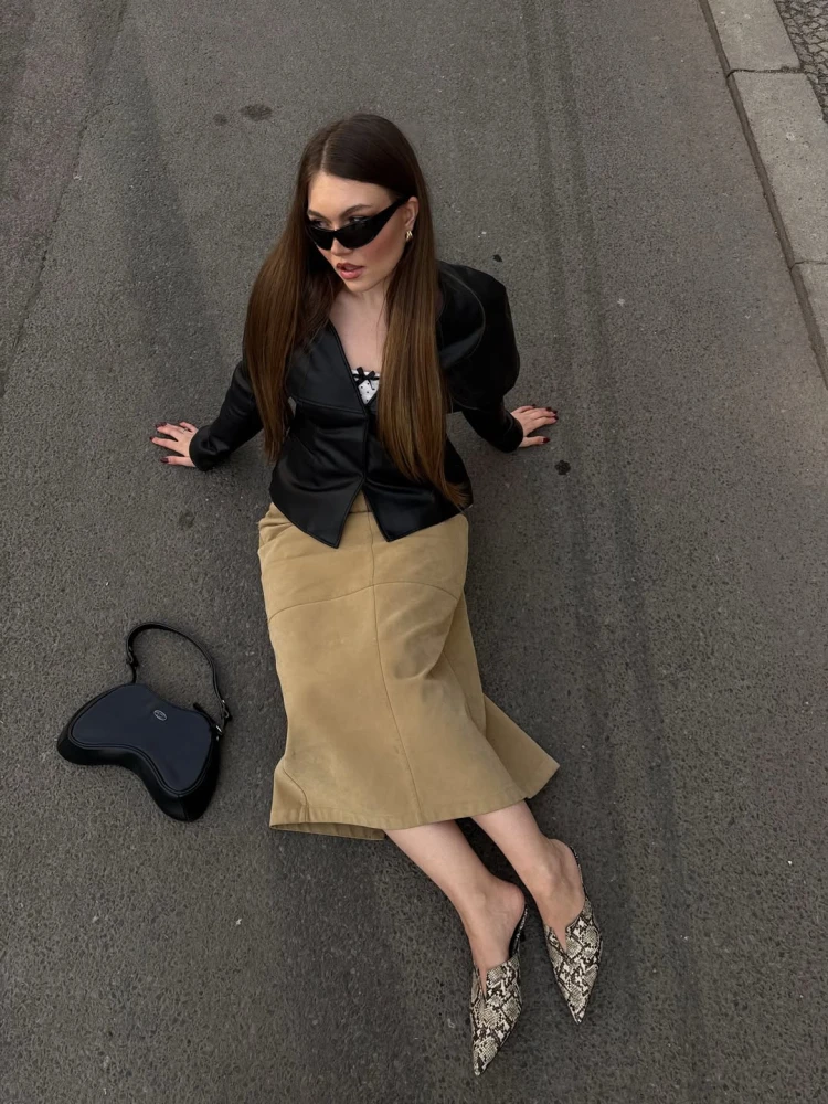 Туфлі зі зміїним принтом